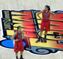 Jude Shimmel and Shoni Shimmel at half court during the Women's Final Four semifinal game against Cal.